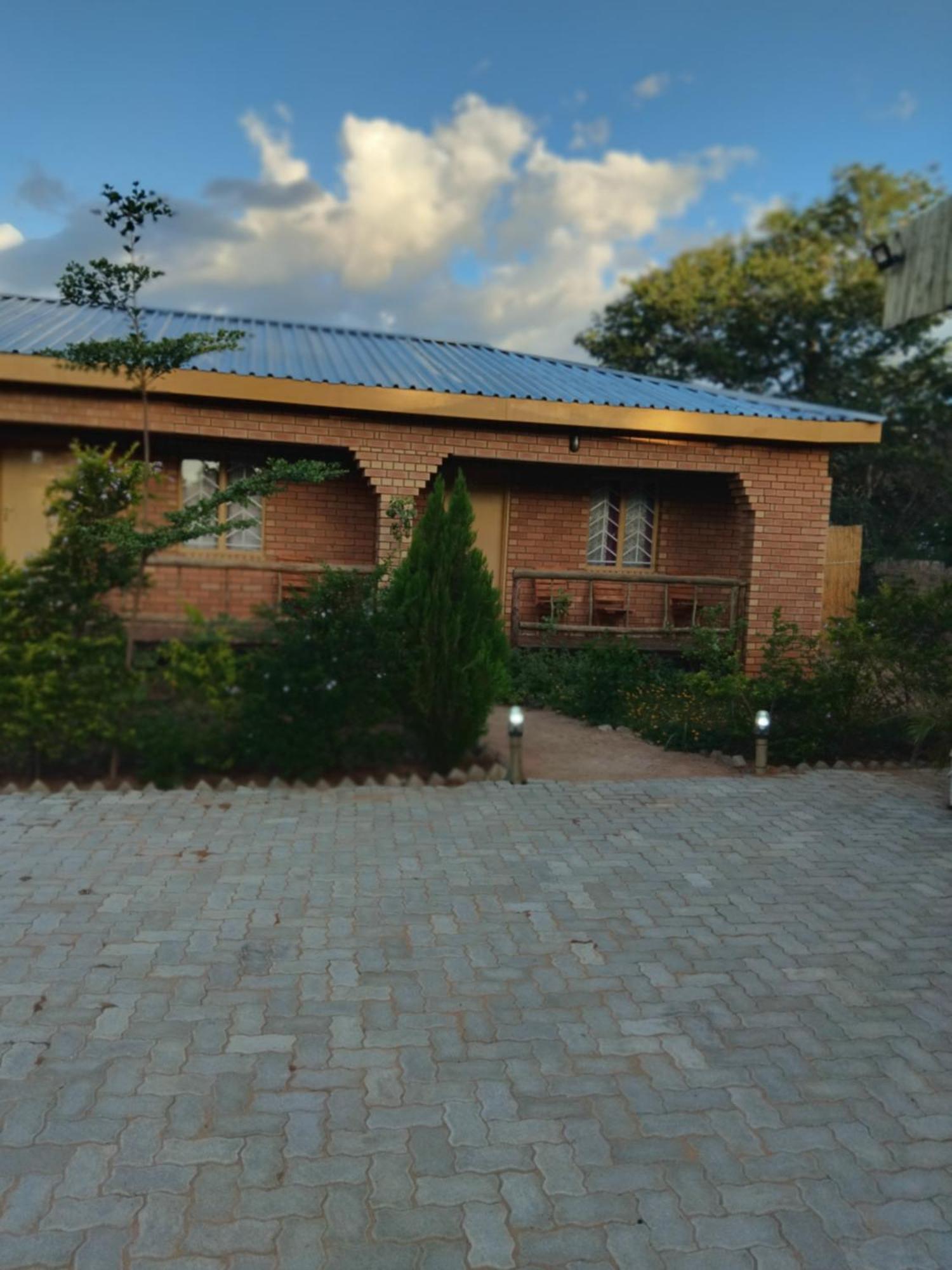 Sunshinevibe Guest House คาซาเนอ ภายนอก รูปภาพ